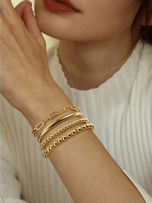 How to Stack 14k Gold Bracelets for a Trendy Look